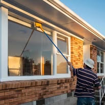 commercial storefront window washing Firestone